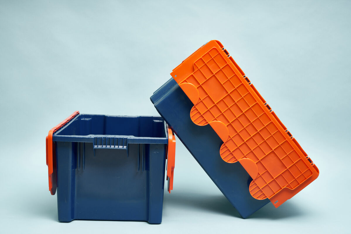 Reusable moving totes with hinged lids — sturdy, stackable, and ready for your move